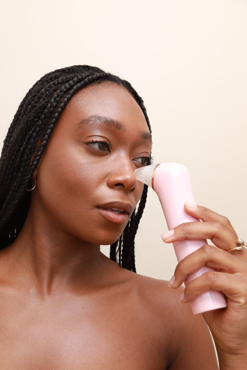 Girl using Skin Gym's Skincare Tools