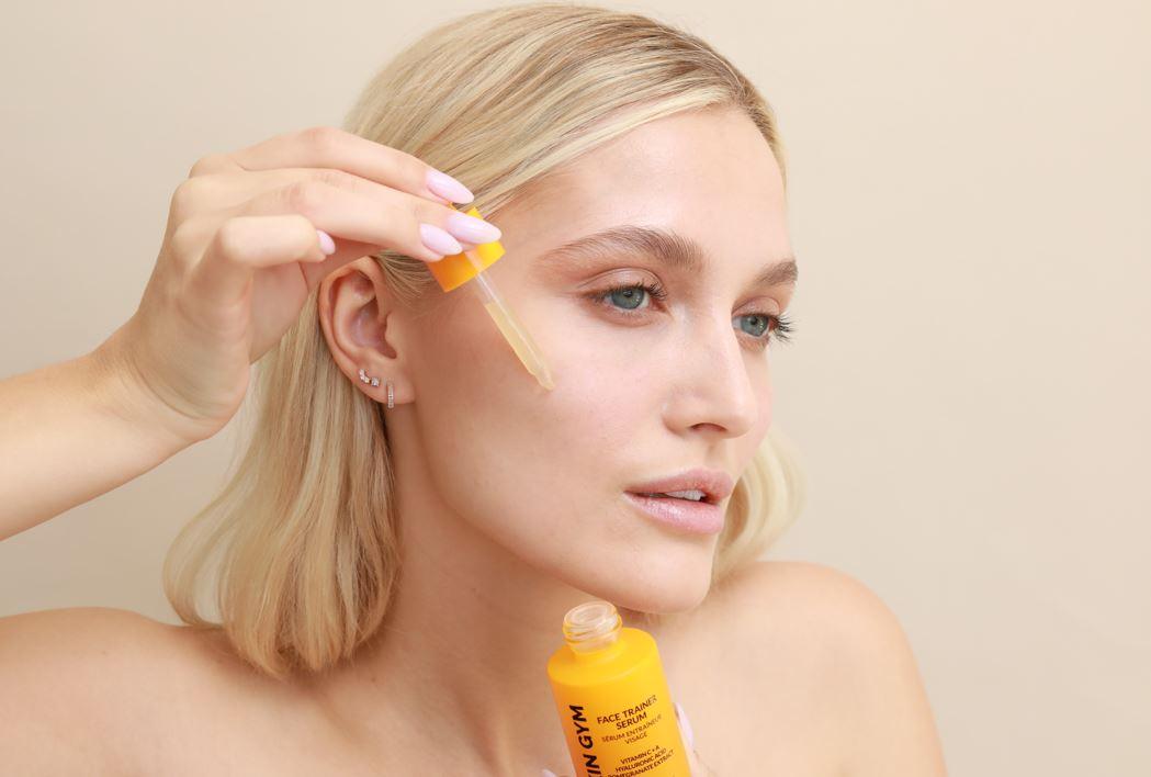 Girl using Skin Gym's Best Vitamin C Skincare Products