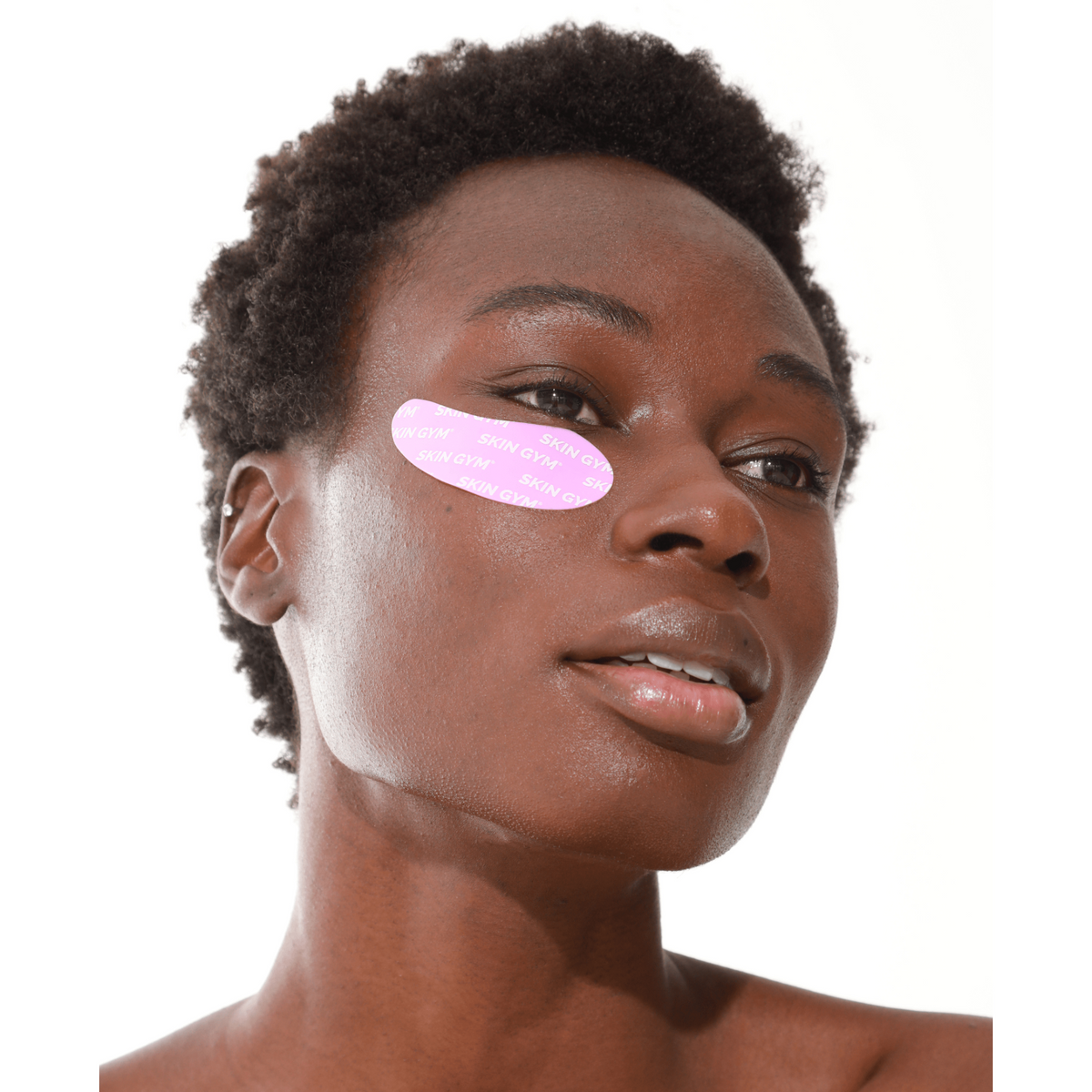 Woman using Under Eye Reusable Patches