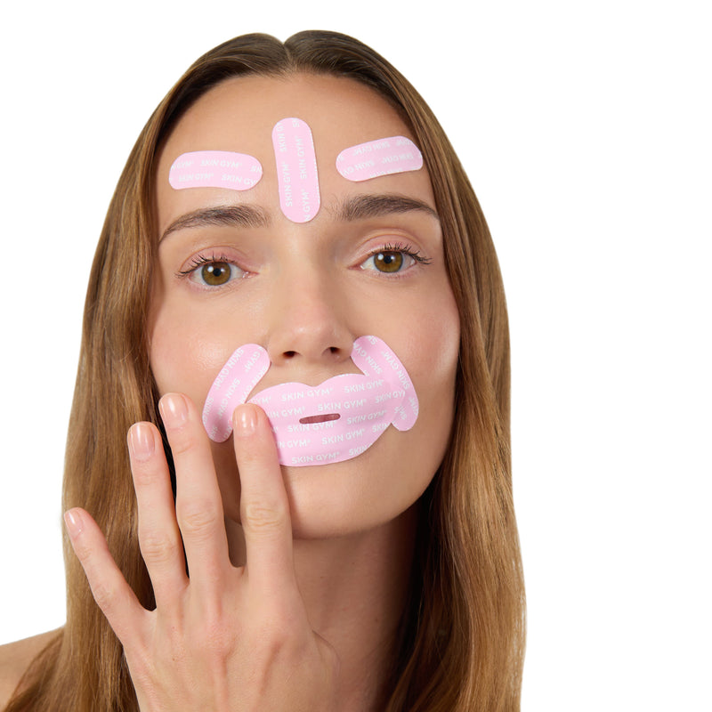 Woman using Skin Gym's Face Tape and Mouth tape
